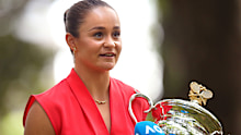 Ash Barty speaks to media with the Daphne Akhurst Memorial Cup after winning the 2022 Australian Open.