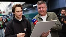 McLaren's Oscar Piastri is interviewed by David Croft upon arriving in the paddock for the Sao Paulo Grand Prix.