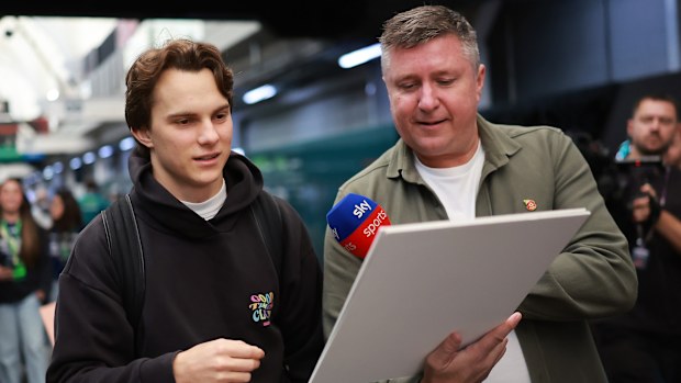 McLaren's Oscar Piastri is interviewed by David Croft upon arriving in the paddock for the Sao Paulo Grand Prix.