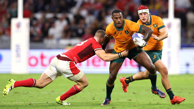 Suliasi Vunivalu of Australia is tackled by George North of Wales.