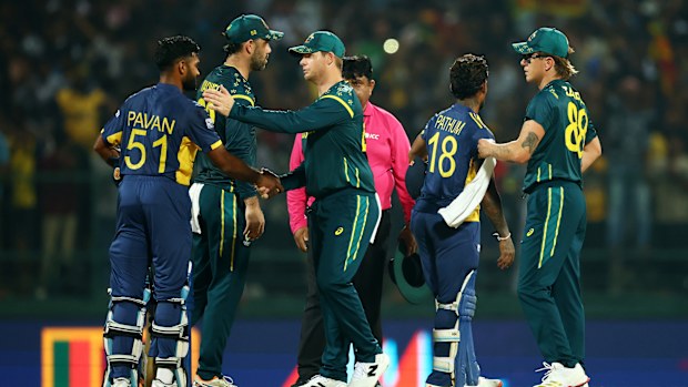 KANDY, SRI LANKA - FEBRUARY 16: Steven Smith of Australia shakes hands with Pavan Rathnayake of Sri Lanka after the ICC Men's T20 World Cup India & Sri Lanka 2026 match between Australia and Sri Lanka at Pallekele Cricket Stadium on February 16, 2026 in Kandy, Sri Lanka. (Photo by Robert Cianflone/Getty Images)