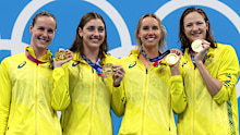 From left: Bronte Campbell, Meg Harris, Emma McKeon and Cate Campbell pictured after winning gold in the women's 4x100m freestyle relay at the Tokyo 2021 Olympics.