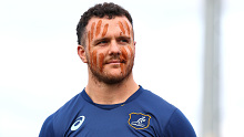 Dylan Pietsch of the Wallabies after having his face painted by First Nations advisor Dean Duncan.