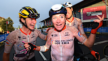 Marianne Vos (left) of Netherlands and Annemiek Van Vleuten (middle) of Netherlands celebrate celebrates the victory after the 95th UCI Road World Championships Women's Elite Road Race in Wollongong.