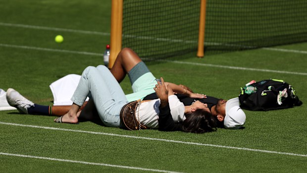 Nick Kyrgios of Australia is seen during a practice session with girlfriend Costeen Hatzi on day twelve of The Championships Wimbledon 2022 at All England Lawn Tennis and Croquet Club on July 08, 2022 in London, England. 
