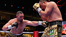 Joseph Parker punches Zhilei Zhang during the WBO Interim World Heavyweight title fight in 2024.