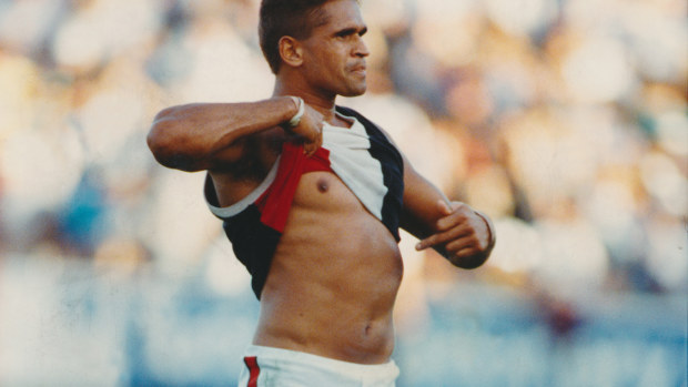 Wayne Ludbey's iconic photo of Nicky Winmar after St Kilda defeated Collingwood in 1993. Thirty years on, Collingwood have formally apologised.
