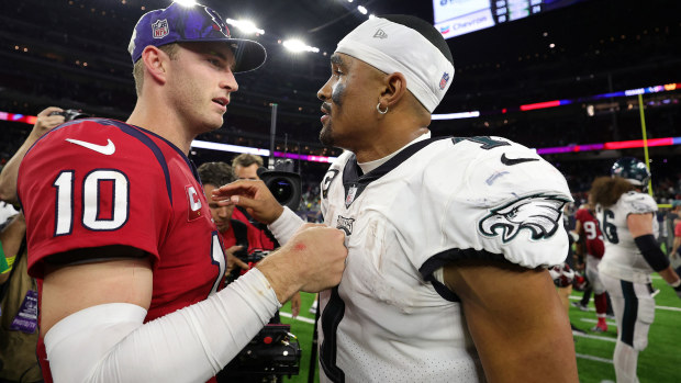 Jalen Hurts #1 of the Philadelphia Eagles and Davis Mills #10 of the Houston Texans greet each other after the game.