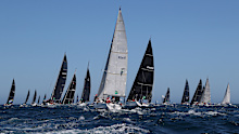 SYDNEY, AUSTRALIA - DECEMBER 26: The fleet head out to seaduring the start of the 2025 Sydney to Hobart on Sydney Harbour on December 26, 2024 in Sydney, Australia. (Photo by Brendon Thorne/Getty Images)