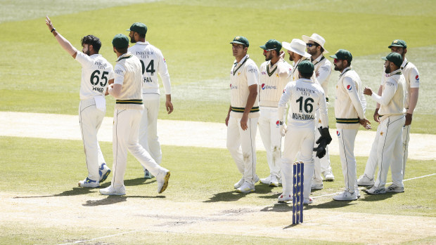 Aamir Jamal of Pakistan celebrates the dismissal of Pat Cummins of Australia during day four of the Second Test Match between Australia and Pakistan at Melbourne Cricket Ground on December 29, 2023 in Melbourne, Australia. (Photo by Daniel Pockett - CA/Cricket Australia via Getty Images)