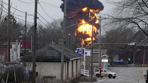 A black plume and fireball rise over East Palestine, Ohio, as a result of a controlled detonation of a portion of the derailed Norfolk Southern trains Monday, Feb. 6, 2023. (AP Photo/Gene J. Puskar)