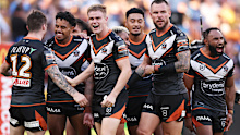 SYDNEY, AUSTRALIA - APRIL 01:  Lachlan Galvin of the Tigers celebrates victory with team mates after the round four NRL match between Parramatta Eels and Wests Tigers at CommBank Stadium, on April 01, 2024, in Sydney, Australia. (Photo by Matt King/Getty Images)