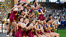 Brisbane celebrates winning the grand final. 