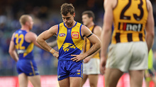 Jamie Cripps is dejected during his side's loss to Hawthorn.