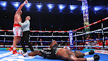 Tyson Fury knocks down Dillian Whyte.