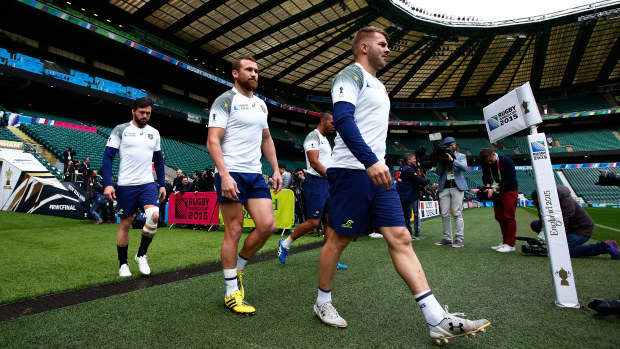 Adam Ashely-Cooper (from left), Matt Giteau, and Drew Mitchell during the Australia captain's run ahead of the 2015 Rugby World Cup Final against New Zealand at Twickenham Stadium.