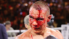 Tim Tszyu walks to his corner after a 12-round fight against Sebastian Fundora.