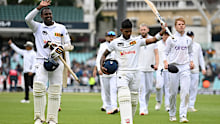 Angelo Mathews and Pathum Nissanka leave the field after Sri Lanka's win. 