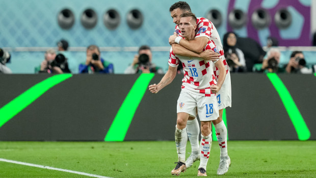 Mislav Orsic of Croatia celebrates after scoring his team's second goal with Ivan Perisic of Croatia during the FIFA World Cup Qatar 2022 3rd Place match between Croatia and Morocco at Khalifa International Stadium on December 17, 2022 in Doha, Qatar. (Photo by Mohammad Karamali/DeFodi Images via Getty Images)