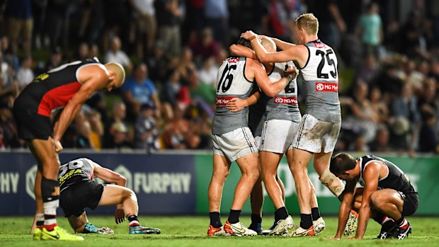Port Adelaide celebrate victory over St Kilda.