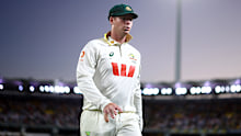 Steve Smith walks off the field after day one