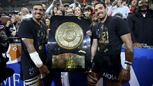 Richie Arnold and twin brother Rory celebrate victory in the Top 14 final.