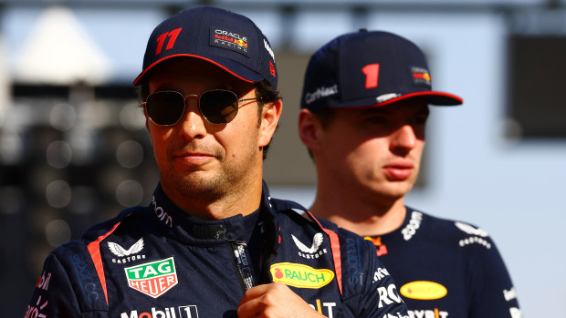 Sergio Perez of Mexico and Oracle Red Bull Racing looks on from the drivers parade prior to the F1 Grand Prix of Abu Dhabi at Yas Marina Circuit on November 26, 2023 in Abu Dhabi, United Arab Emirates. (Photo by Mark Thompson/Getty Images)