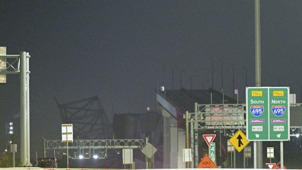 Parts of the Francis Scott Key Bridge remain after a container ship collided with a support Tuesday, March 26, 2024, in Baltimore. 