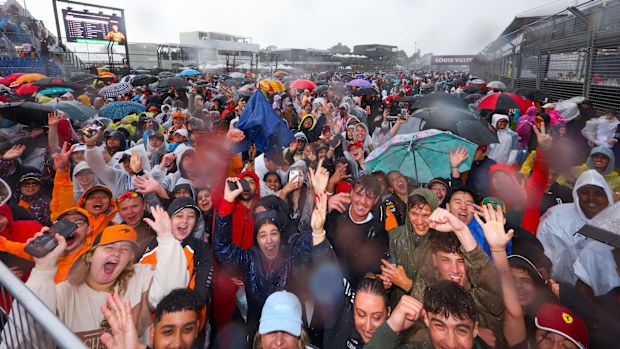 Fans hit the track after a wet and wild Australian Grand Prix.