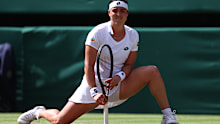 LONDON, ENGLAND - JULY 02:  Ons Jabeur of Tunisia reacts against Garbine Muguruza of Spain during their Ladies Singles Third Round match during Day Five of The Championships - Wimbledon 2021 at All England Lawn Tennis and Croquet Club on July 02, 2021 in London, England. (Photo by Julian Finney/Getty Images)