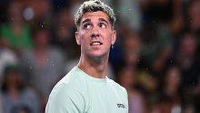 MELBOURNE, AUSTRALIA - JANUARY 17: Thanasi Kokkinakis of Australia looks on as rain falls on KIA Arena during their round one singles match against Fabio Fognini of Italy during day two of the 2023 Australian Open at Melbourne Park on January 17, 2023 in Melbourne, Australia. (Photo by Quinn Rooney/Getty Images)