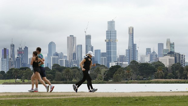 People enjoy their one hour of exercise allowed under stage 4 restrictions at Albert Park on August 16, 2020 in Melbourne, Australia. 