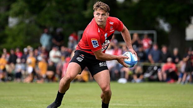James O'Connor of the Crusaders passes the ball during a Super Rugby trial match.