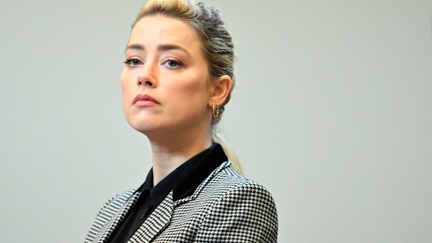 Actor Amber Heard stands in the courtroom at the Fairfax County Circuit Courthouse in Fairfax, Va., Tuesday, May 24, 2022.  