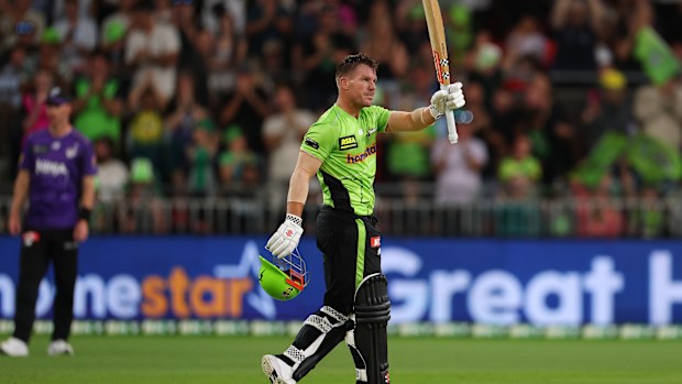 SYDNEY, AUSTRALIA - JANUARY 03: David Warner of the Thunder celebrates scoring a century during the BBL match between Sydney Thunder and Hobart Hurricanes at ENGIE Stadium, on January 03, 2026, in Sydney, Australia (Photo by Morgan Hancock/Getty Images)