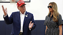 Republican presidential nominee former President Donald Trump speaks as former first lady Melania Trump listens after they voted on Election Day at the Morton and Barbara Mandel Recreation Center, Tuesday, Nov. 5, 2024, in Palm Beach, Floria.