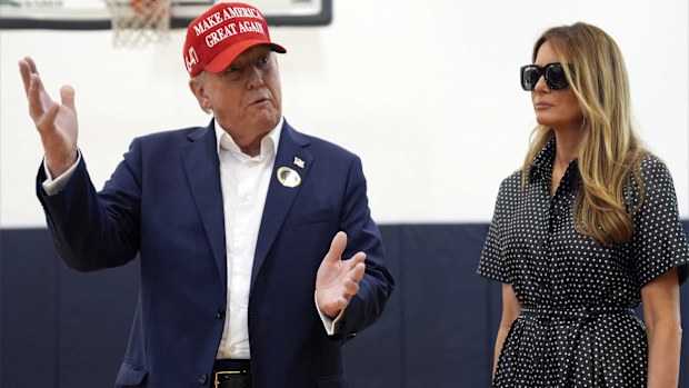 Republican presidential nominee former President Donald Trump speaks as former first lady Melania Trump listens after they voted on Election Day at the Morton and Barbara Mandel Recreation Center, Tuesday, Nov. 5, 2024, in Palm Beach, Floria.