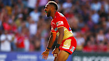 Hamiso Tabuai-Fidow of the Dolphins celebrates a try during round one.