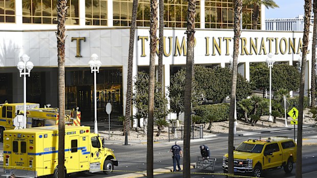 Clark County Fire Department crews work outside Trump International Hotel in Las Vegas after the fire and explosion of a Tesla Cybertruck in the valet area.