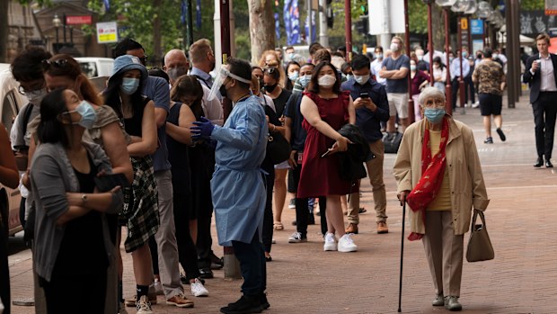 People wait for COVID-19 testing at the Macquarie St Pharmacy. Street Pharmacy in Sydney.