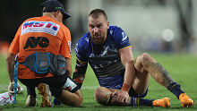 Clint Gutherson attended to by a trainer after an injury during the round seven NRL match between Parramatta Eels and Dolphins. (Photo by Mark Metcalfe/Getty Images)