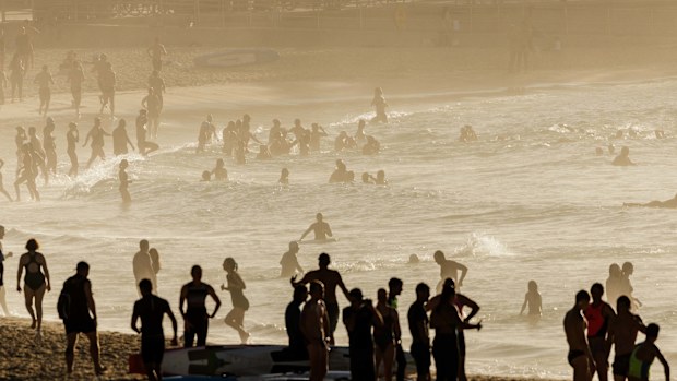 A packed Bondi Beach at sunrise on November 27, 2024 in Sydney, Australia.