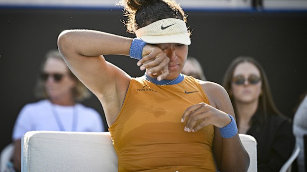 Naomi Osaka of Japan is emotional after forfeiting her ASB Classic final.