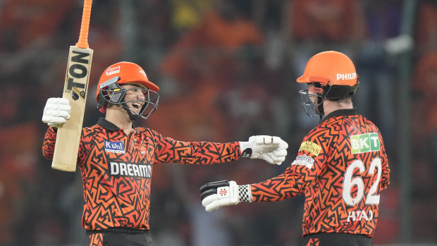 Sunrisers Hyderabad's Abhishek Sharma, left, celebrates his fifty runs with Travis Head during the Indian Premier League cricket match between Sunrisers Hyderabad and Lucknow Super Giants in Hyderabad, India, Wednesday, May 8, 2024. (AP Photo/Mahesh Kumar A.)