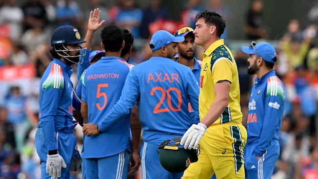 Matthew Renshaw of Australia walks off after being dismissed LBW by Washington Sundar