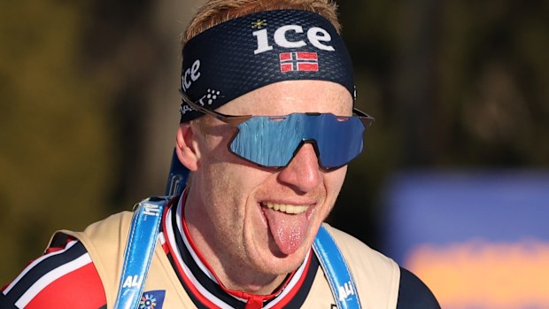 Bronze medallist, Johannes Thingnes Boe of Team Norway, reacts after crossing the finish line in the Men's 15km Mass Start Competition event in the IBU World Championships Biathlon Lenzerheide at Roland Arena on February 23, 2025 in Lenzerheide, Switzerland.