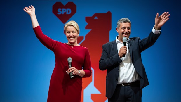 Franziska Giffey, left, top candidate of the Berlin SPD for the office of Governing Mayor, and Raed Saleh, co-party leader of the Berlin SPD take the stage at the election party of the Berlin SPD in Kreuzberg, Berlin on Sunday. 
