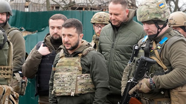 Ukrainian President Volodymyr Zelenskyy examines the site of a recent battle in Bucha close to Kyiv, Ukraine on April 4, 2022