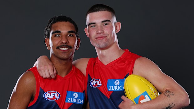 Latrelle Pickett and Xavier Taylor pose after being selected by the Demons as part of the 2025 AFL Draft 