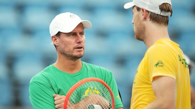 Australian Davis Cup captain Lleyton Hewitt speaks to Luke Saville during a practice session ahead of the Davis Cup Qualifier between Australia and Hungary.